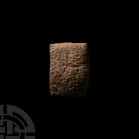 Old Babylonian Literary Cuneiform Tablet
2nd millennium B.C. A roughly pillow-shaped ceramic tablet, bearing multiple rows of cuneiform text to four ...