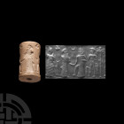 Old Babylonian White Stone Cylinder Seal with Presentation Scene
2nd millennium B.C. A carved limestone cylinder seal with frieze depicting a process...