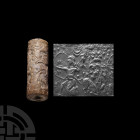 Western Asiatic Stone Cylinder Seal with Hunting Scene
Late 2nd millennium B.C. A carved jasper cylinder seal bearing a circumferential frieze of an ...