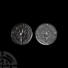 Western Asiatic Conical Seal with Symbol and Inscription
1st millennium B.C. or earlier. A conoid black limestone stamp seal bearing enigmatic symbol...