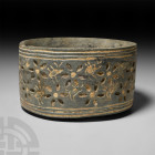 Bactrian Stone Bowl with Incised Decoration
2nd millennium B.C. A chlorite bowl with a vertical wall, the exterior decorated with a circumferential f...