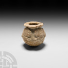 Neo-Sumerian Alabaster Kohl Pot with Lions
2nd-1st millennium B.C. An alabaster kohl jar composed of a bulbous body with broad everted rim; two natur...
