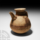 Western Asiatic Finely Painted Jar
2nd-1st millennium B.C. A ceramic whiteware pitcher with rounded underside, conical body, trumpet-shaped neck with...