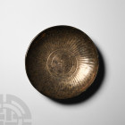 Sassanian Decorated Dish
3rd-7th century A.D. A shallow copper-alloy bowl with tinning, the interior decorated with concentric bands around a central...