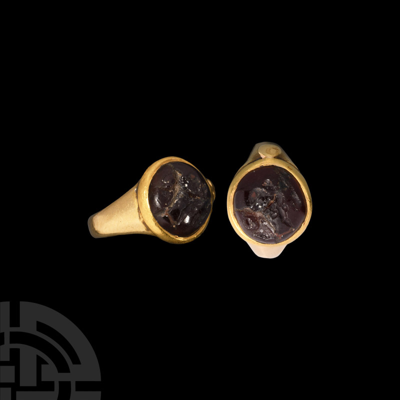 Sassanian Gold Ring with Advancing Figure Gemstone
5th-6th century A.D. A gold ...