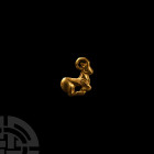 Ziwiye Type Gold Ibex Attachment
8th-7th century B.C. A gold fitting in the form of a reclining ibex with horns arching over the back of the head, fr...