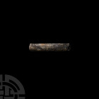 Rolled Aramaic Lead Magical Text
2nd-3rd century A.D. A rolled sheet-metal magical document with inscribed text in Aramaic. 41 grams, 60 mm (2 3/8 in...