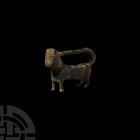 Seljuk Lion Padlock
12th century A.D. A bronze padlock in the form of a standing lion, its recurved tail forming the bar, opening to the chest to acc...