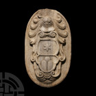 Renaissance Marble Coat of Arms
19th century A.D. A marble coat of arms in raised relief featuring a helmet and single mullet, enclosed by a plain bo...