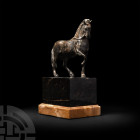 Renaissance Stepping Horse Statuette
Circa 16th century A.D. A bronze stallion modelled in the round with naturalistic anatomical detailing, right fo...