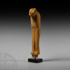 Egyptian Wooden Animal-Headed Furniture Leg
Late Period, 664-332 B.C. A carved wooden furniture leg formed as the head, chest and split forelegs of a...