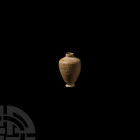 Egyptian Miniature Alabaster Jar
Late Period, 664-332 B.C. A miniature alabaster piriform jar with dished base and narrow neck. 2.02 grams, 21 mm (7/...