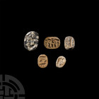 Egyptian Scarab Collection
New Kingdom, 1315-332 B.C. and later. A mixed group of scarabs comprising: two tan-coloured unglazed steatite with hierogl...