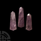 Natural History - Amethyst Obelisk Set
. A graduated set of three amethyst obelisks with bevelled long edges; supplied in a cardboard specimen tray. ...