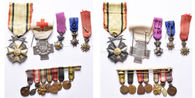 BELGIQUE, lot de 12 décorations attribuées à Mme Suzanne Lippens-Orban: groupe de 7 miniatures (médaille de la reine Elisabeth avec croix rouge, médai...