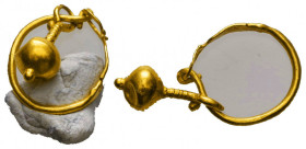 ANCIENT GREEK GOLD EARING ( 4TH-1ST CENTURY BC.)
Condition : See picture. No return.
Weight : 1.2 g
Diameter: 13 mm