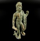 Roman Jupiter Statuette
1st-2nd century CE
Bronze, 84 mm, 102 g
Nude standing statuette of Jupiter stepping on his right foot, a draped mantle over...