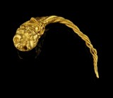 Greek Gold Earring
4th-3rd century BCE
Gold, 27 mm, 1,60 g
Gold earring with a finely formed lion head terminal, twisted wire hoop terminating in a...