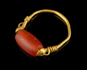 Etruscan Gold Signet-Ring
4th-3rd century BCE
Gold, Carnelian, 21 mm overall, 17 mm internal diameter, 1,96 g
Gold signet-ring with carnelian gem s...