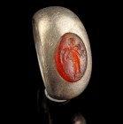 Roman Silver Ring With Carnelian Intaglio
1st-3rd century CE
Silver, Carnelian, 25 mm overall, 20 internal diameter, 12,85 g
Intact and wearable. I...