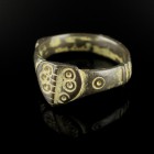 Ottoman Bronze Ring
15th-17th century CE
Bronze, 30 mm overall, 24 mm internal diameter, 9,08 g
Large bronze ring. Richly decorated hoop and ringpl...