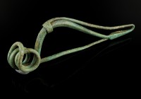 Celtic Bronze Fibula
2nd-1st century BCE, La Tène C-D
Bronze, 110 mm, 21,91 g
Intact bronze fibula with four-coil spring and external chord wrapped...