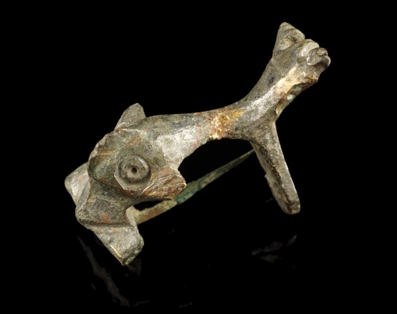 Roman Dolphin Fibula
2nd-3rd century CE
Tinned Bronze, 35 mm, 9,50 g
Bow in f...