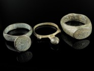 Byzantine/Ottoman Rings
14th-17th century CE
Bronze, 27-26 mm
Lot of three rings.
Very fine condition.
Ex. Coll. M.C., acquired at the european a...