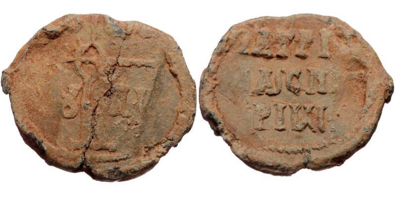 Byzantine seal (Lead, 27,2 mm, 10,63 g).
Obv: Legend in three lines.
Rev: Cruc...