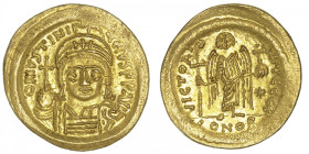 EMPIRE BYZANTIN
Justinien (527-565). Solidus ND, Constantinople, 5e officine. BC.139 ; Or - 4,46 g - 21 mm - 6 h
Avec E d’officine. Superbe.