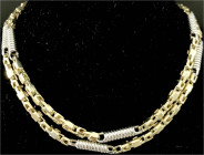Colliers und Halsketten
Kette Gelbgold 585/1000 mit Weißgold-Elementen. Länge 60 cm. 68,87 g.