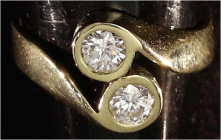 Fingerringe
Damenring Gelbgold 585/1000 mit zwei Brillanten, zusammen 0,75 ct. Ringgröße 18. 5,87 g.