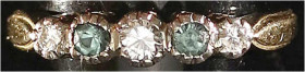 Fingerringe
Damenring Gelbgold 585/1000, besetzt mit 3 Brillanten (2 X ca. 0,05 ct, 1 X ca. 0,1 ct) und 2 grünen Turmalinen. Ringgröße 19. 3,82 g.