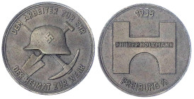 Drittes Reich
Zinkmedaille 1938 v.d. Philipp Holzmann AG, Freiburg/Helm mit Hakenkreuz, 35 mm. vorzüglich, Korrosion am Rand