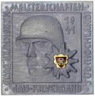 Drittes Reich
Quadratische Zinkplakette mit Teil-Emaille (rot-goldenes NSRB-Logo) 1941. NS-Reichskriegerbund, Meisterschaften Gau-Kr.-Verband Süd (Ho...