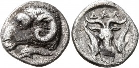 PHOKIS. Delphi. Circa early 4th century BC. Trihemiobol (Silver, 11 mm, 1.22 g, 3 h). Head of a ram to left; below, dolphin to left. Rev. ΔΑΛ Facing h...