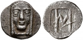 IONIA. Kolophon. Circa 500-450 BC. Hemiobol (Silver, 8 mm, 0.42 g, 6 h). Facing head of Apollo. Rev. Monogram of HM (value mark) within incuse square....