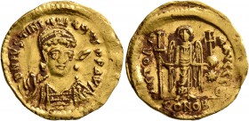 Justinian I, 527-565. Solidus (Gold, 21 mm, 4.41 g, 6 h), Constantinopolis. D N IVSTINIANVS P P AVG Helmeted, diademed and cuirassed bust of Justinian...