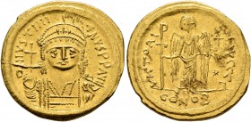 Justinian I, 527-565. Solidus (Gold, 19 mm, 4.43 g, 6 h), Constantinopolis. D N IVSTINIANVS P P AVI Helmeted and cuirassed bust of Justinian facing, h...