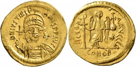 Justinian I, 527-565. Solidus (Gold, 22 mm, 4.46 g, 6 h), Constantinopolis. D N IVSTINIANVS P P AVI Helmeted and cuirassed bust of Justinian facing, h...