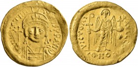 Justinian I, 527-565. Solidus (Gold, 20 mm, 4.42 g, 7 h), Constantinopolis. D N IVSTINIANVS P P AVI Helmeted and cuirassed bust of Justinian facing, h...
