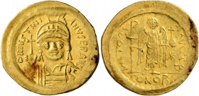 Justinian I, 527-565. Solidus (Gold, 21 mm, 4.47 g, 6 h), Constantinopolis. D N IVSTINIANVS P P AVI Helmeted and cuirassed bust of Justinian facing, h...