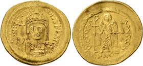 Justinian I, 527-565. Solidus (Gold, 22 mm, 4.46 g, 7 h), Constantinopolis. D N IVSTINIANVS P P AVI Helmeted and cuirassed bust of Justinian facing, h...