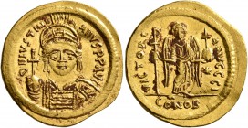 Justinian I, 527-565. Solidus (Gold, 21 mm, 4.46 g, 6 h), Constantinopolis. D N IVSTINIANVS P P AVI Helmeted and cuirassed bust of Justinian facing, h...