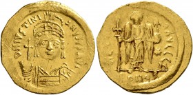 Justinian I, 527-565. Solidus (Gold, 20 mm, 4.45 g, 6 h), Constantinopolis. D N IVSTINIANVS P P AVI Helmeted and cuirassed bust of Justinian facing, h...