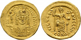 Justin II, 565-578. Solidus (Gold, 20 mm, 4.48 g, 6 h), Constantinopolis. D N IVSTINVS P P AVI Helmeted and cuirassed bust of Justin II facing, holdin...