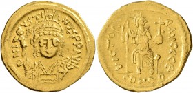 Justin II, 565-578. Solidus (Gold, 20 mm, 4.38 g, 6 h), Constantinopolis. D N IVSTINVS P P AVI Helmeted and cuirassed bust of Justin II facing, holdin...