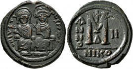 Justin II, with Sophia, 565-578. Follis (Bronze, 28 mm, 13.80 g, 7 h), Nicomedia, 566/7. D N IVSTINVS P P AVG Justin, holding globus cruciger in his r...