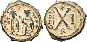Phocas, 602-610. Dekanummium (Bronze, 17 mm, 2.55 g, 6 h), Theoupolis (Antiochia), 602/3. O N FOC-AS PЄ Phocas standing facing, holding globus crucige...