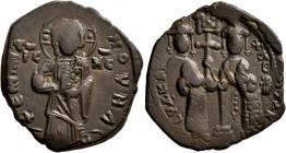 Constantine X Ducas, with Eudocia, 1059-1067. Follis (Bronze, 27 mm, 7.43 g, 5 h), Constantinopolis. +ЄΜΜΑΝΟVHΛ Christ Emmanuel standing facing on foo...